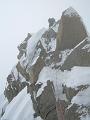 Lazell emerging over rocks, Cosmiques Arete